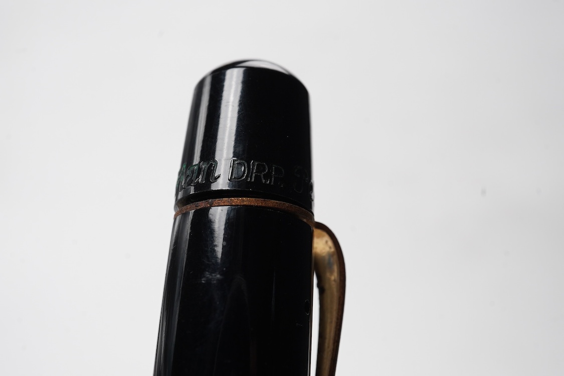 A Pelikan 100N fountain pen fitted with a 14ct. gold Pelkan nib